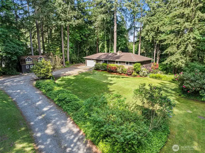 This home is nestled on 1.5 acres just off of Peacock Hill and is on the market for the very first time!