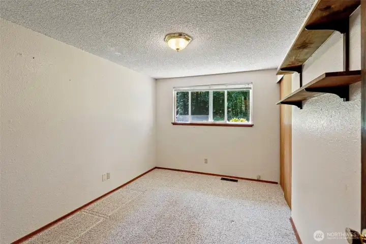 Another of the three bedrooms.