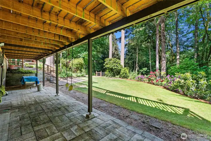 The lower level enjoys French doors, giving easy access to the beautiful back yard.