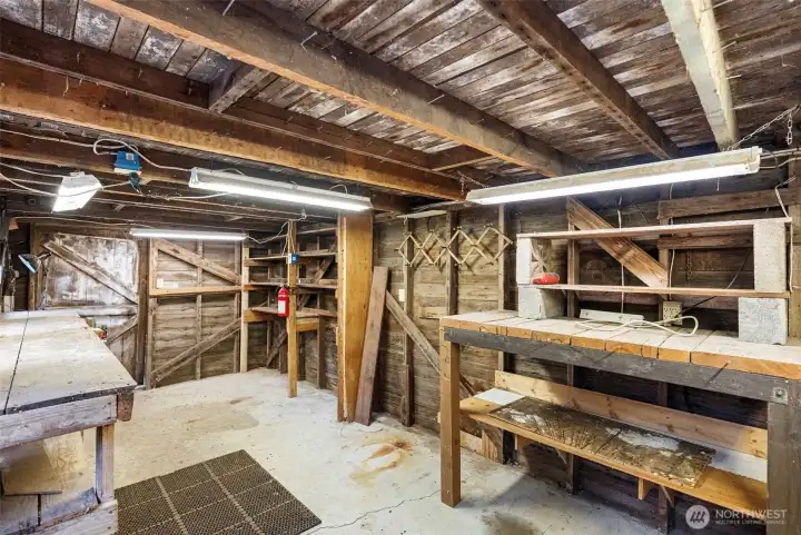 Inside of this building with workbenches and lots of storage.