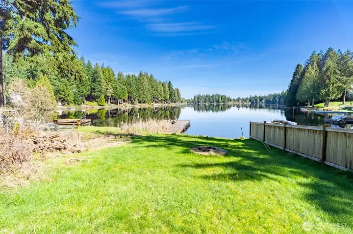 Backyard leading to dock and waterfront