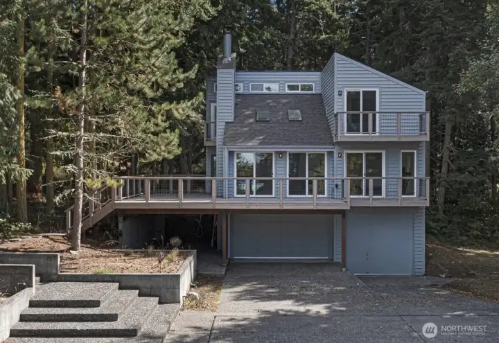 A private driveway leads to this remodeled Lopez Island home, surrounded by mature evergreens and offering a peaceful Northwest setting near Fisherman Bay. A private driveway leads to this remodeled Lopez Island home, surrounded by mature evergreens and offering a peaceful Northwest setting near Fisherman Bay.