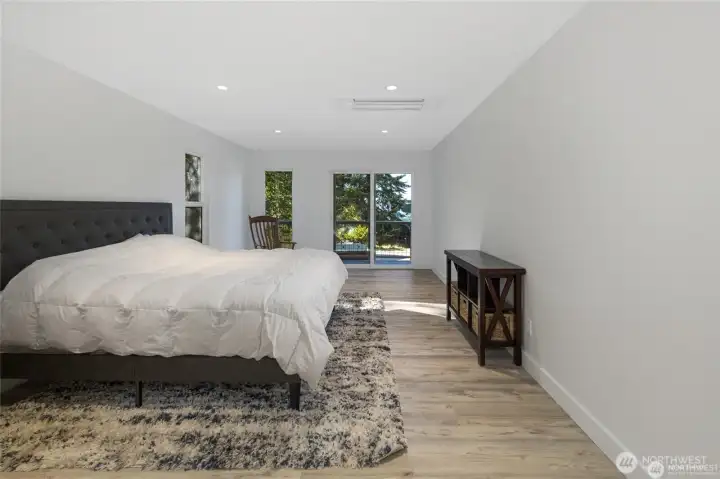 Generous bedroom space, natural light, and a calm neutral palette create a comfortable retreat within this updated Lopez Island home. Generous bedroom space, natural light, and a calm neutral palette create a comfortable retreat within this updated Lopez Island home.