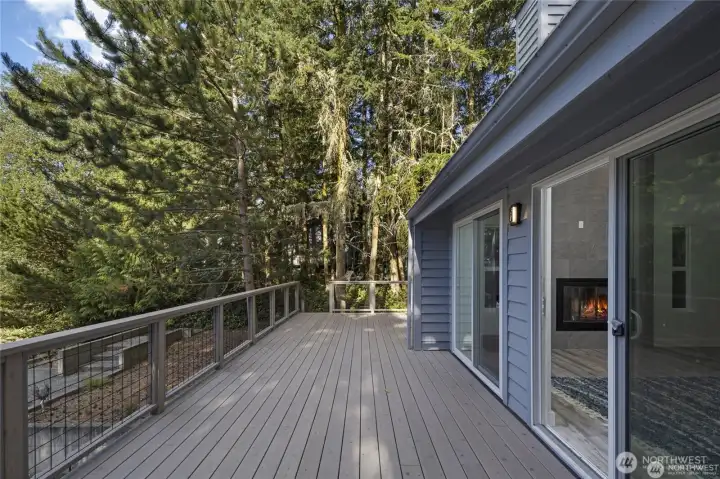 Step outside to the expansive new cedar deck, ideal for summer dinners, entertaining friends, or relaxing after a day on Fisherman Bay. Step outside to the expansive new cedar deck, ideal for summer dinners, entertaining friends, or relaxing after a day on Fisherman Bay.