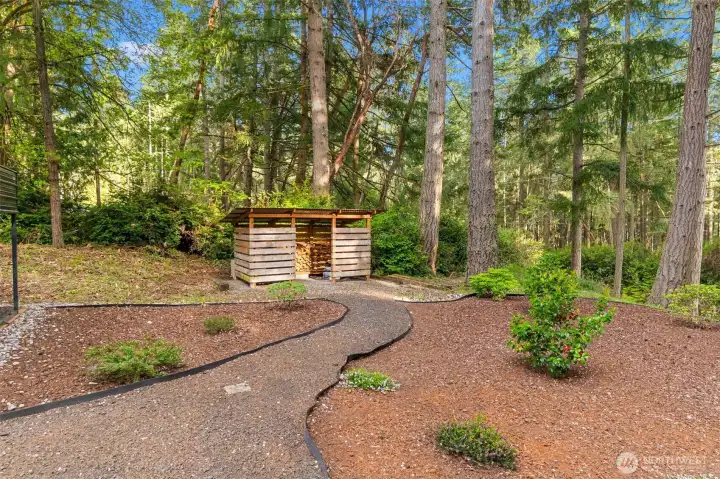 Cedar wrapped firewood shelter