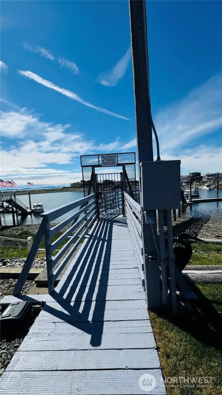 The moorage dock entry is gated for private access to your moorage slip. The view is to the West... The moorage dock entry is gated for private access to your moorage slip. The view is to the West...