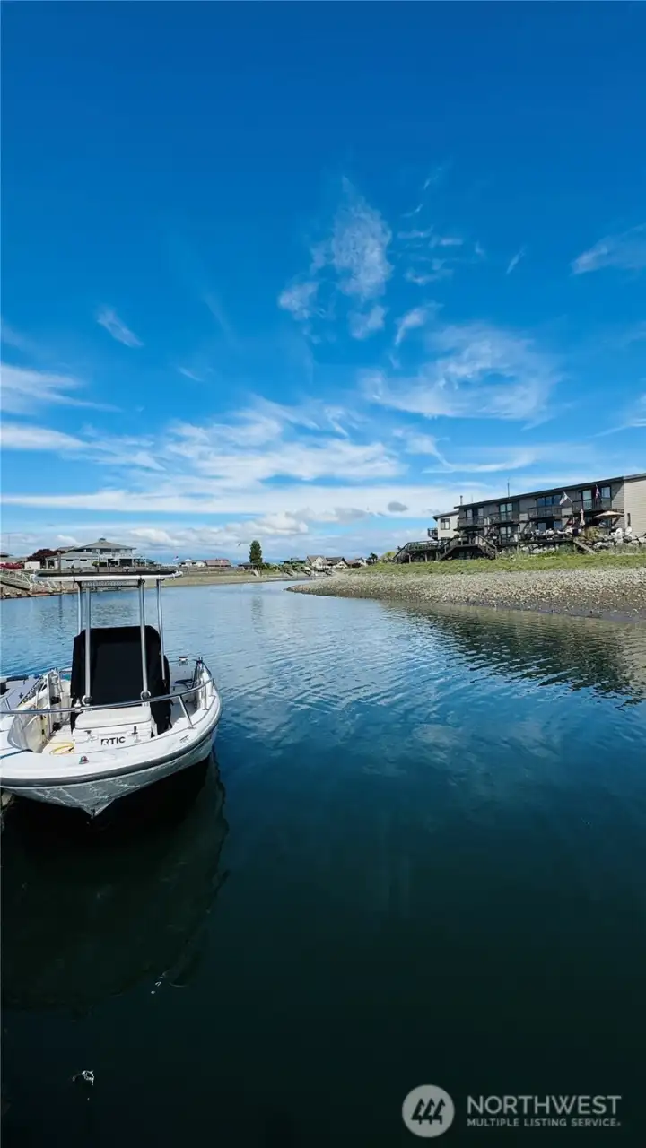 This view from across the channel towards the townhome second unit from the left towards the East... This view from across the channel towards the townhome second unit from the left towards the East...