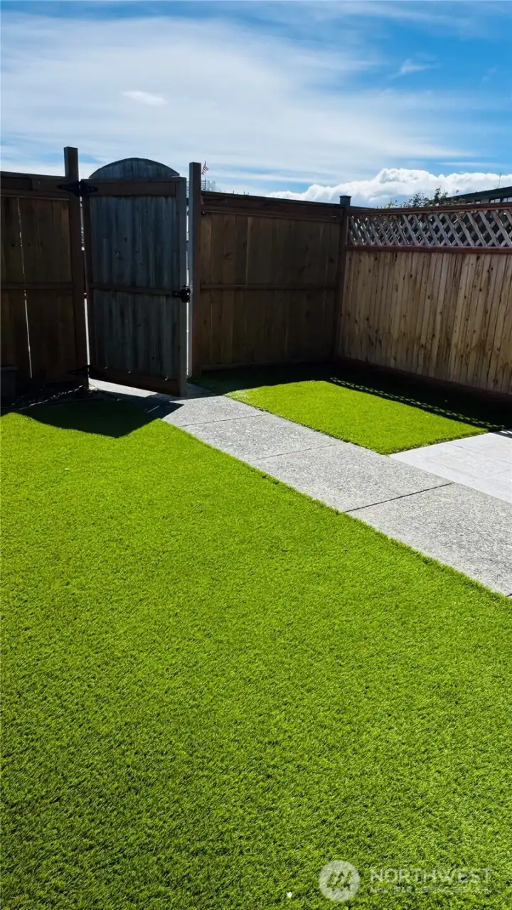 Gorgeous low maintenance astro turf in your private courtyard entry and a newer large patio. Gorgeous low maintenance astro turf in your private courtyard entry and a newer large patio.
