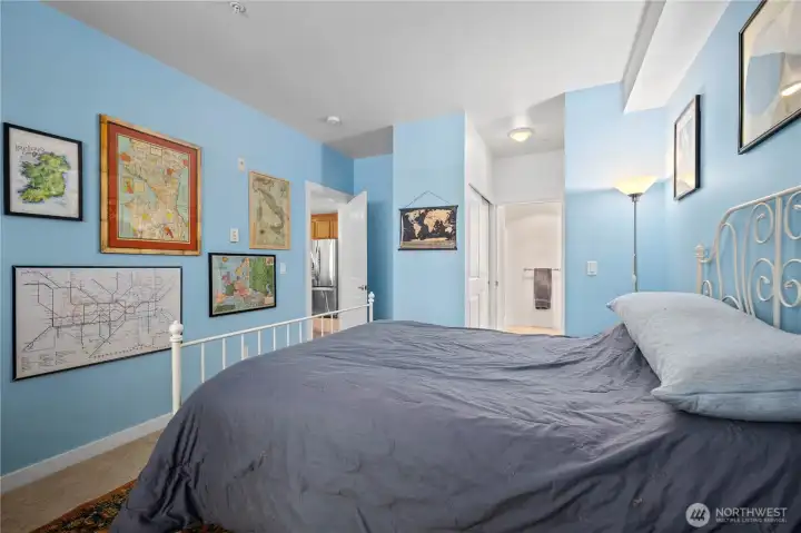 Bright primary bedroom with a large window, leafy views, and space for comfortable everyday living. Bright primary bedroom with a large window, leafy views, and space for comfortable everyday living.