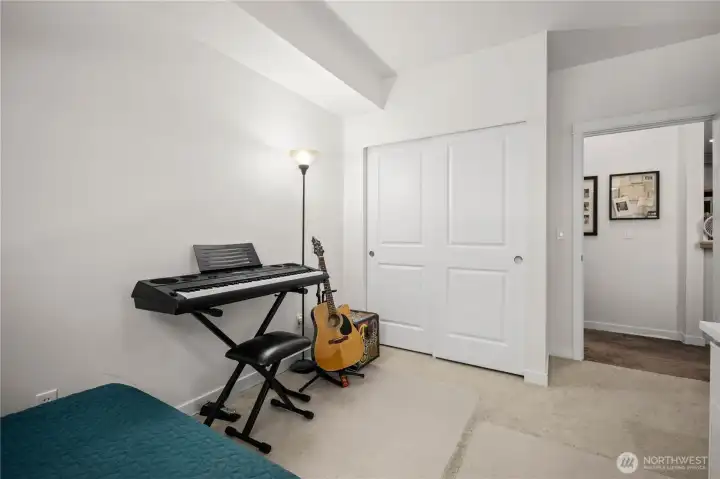 Bright secondary bedroom with natural light and flexible space for an office, guest room, or hobby area. Bright secondary bedroom with natural light and flexible space for an office, guest room, or hobby area.