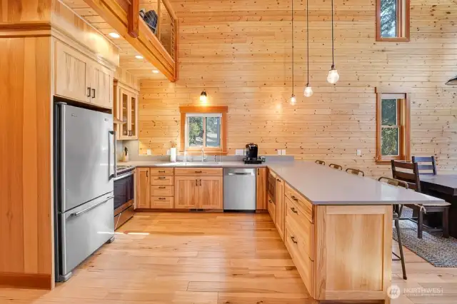 Stainless Steel appliances, custom handmade cabinets, and quartz countertops. This kitchen is spectacular.