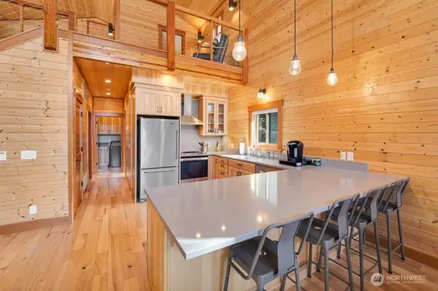 Stainless Steel appliances, custom handmade cabinets, and quartz countertops. This kitchen is spectacular.