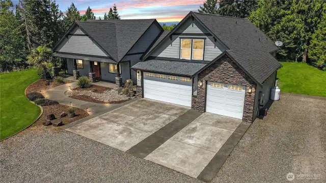 A private estate nestled on expansive grounds, offering seclusion without sacrificing convenience. virtual evening setting.