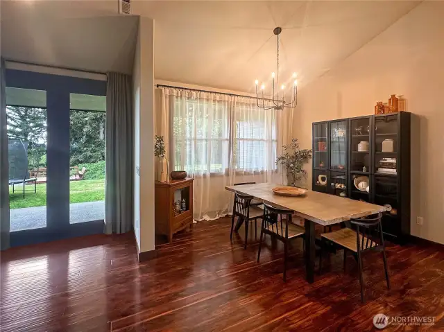 The open-concept layout seamlessly connects the kitchen, dining area, and living room—perfectly designed for hosting large gatherings and effortless entertaining.