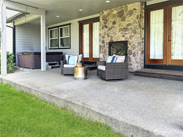 Back patio to extend your entertaining outdoors.  virtually enhanced grass.
