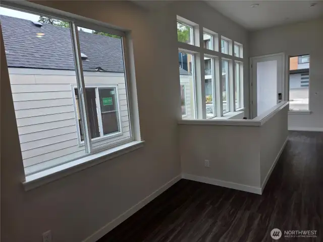 Top level loft area outside primary bedroom, perfect for a reading nook!