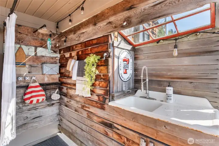Outdoor shower off attached boathouse   4 North Salmon Beach
