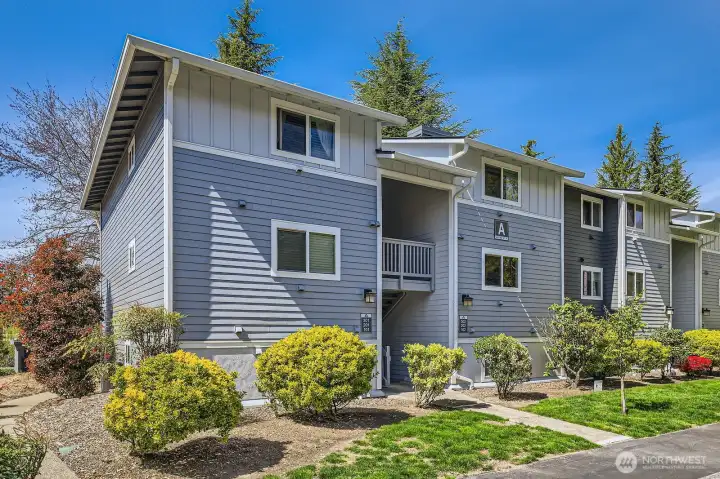 Top floor unit overlooking Woodinville with a dedicated parking spot directly in front of home.