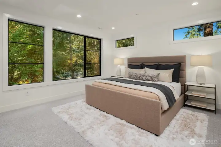 Designer primary suite with five-piece bath & heated floors