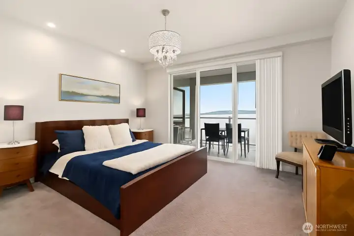 Wake up to picturesque views every morning in this spacious primary suite that can easily fit a king size bed and more. *Virtually staged*