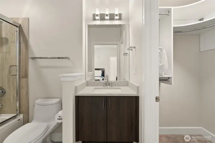 This photo puts a whole new meaning to 'elongated' toilets!  But it does let you see the layout and the closet of the bathroom off the 2nd bedroom.