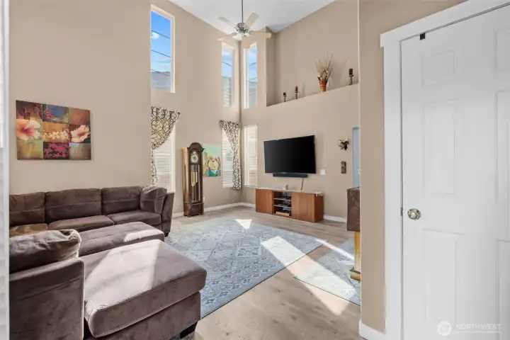 Bright Living Spaces with Soaring Ceilings & New Laminate Flooring