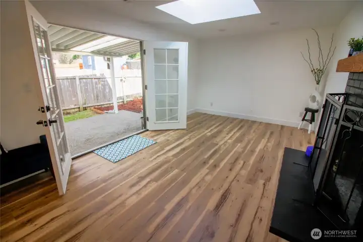 Greatroom opens up with frenchdoors to your outdoor patio space