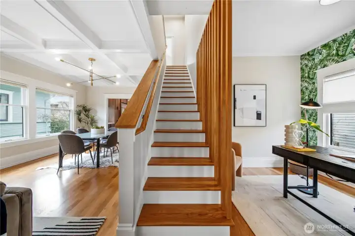 Gorgeous hardwoods and custom railing bring an modern touch to the 2nd story expansion