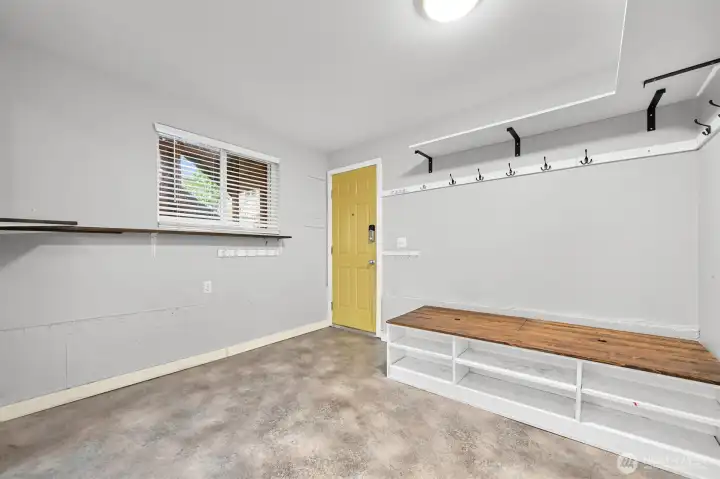 The carport entry to the lower level ADU/ bonus space. This could be a dining/living area for the ADU