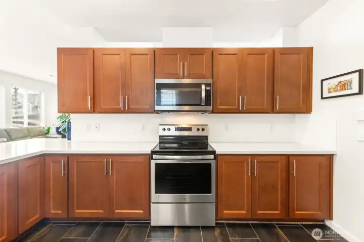 Hardwood cabinets for days.