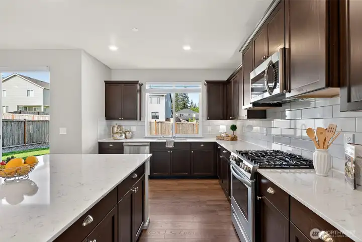 Gorgeous cabinetry and tons of counter space