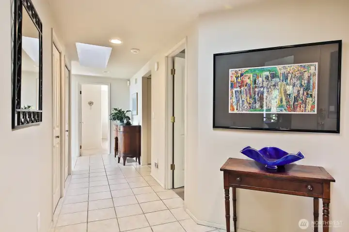 Ceramic tiles and bright hall welcome you to this view home.