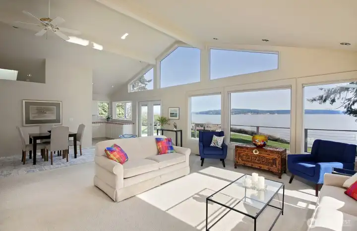 Light filled great room opens to the deck for seamless indoor-outdoor living.