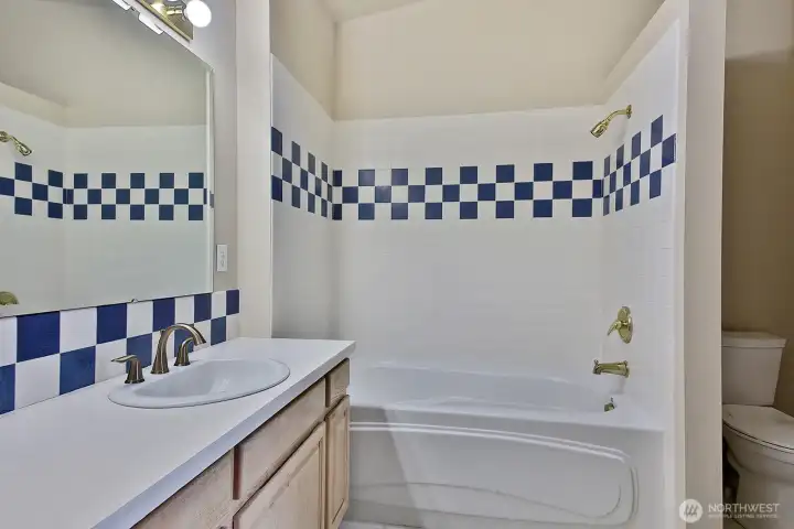 Primary bath tub and separate shower.