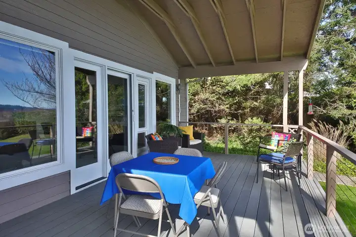 Covered deck to enjoy the outdoors even on rainy days.