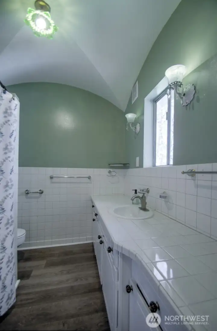 Full bath with custom ceiling