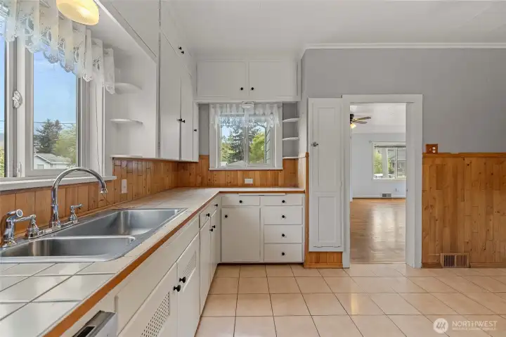 Original period cabinets - this fantastic kitchen provides tons of space for a center breakfast table!