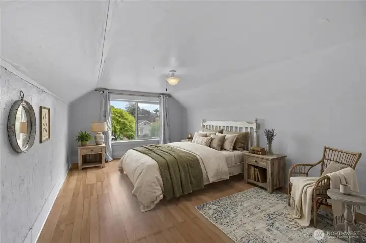 Upper level bedroom #1 - south facing with walk-in closet beautiful fir floors