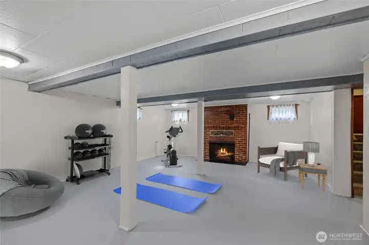 Lower level rec-room - Virtually staged - flames in fireplace virtual
