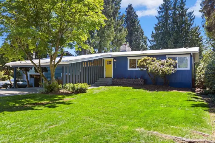 Welcoming curb appeal with fresh exterior updates and a sunny front lawn