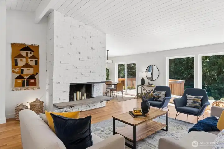 Spacious gathering space centered around the cozy fireplace