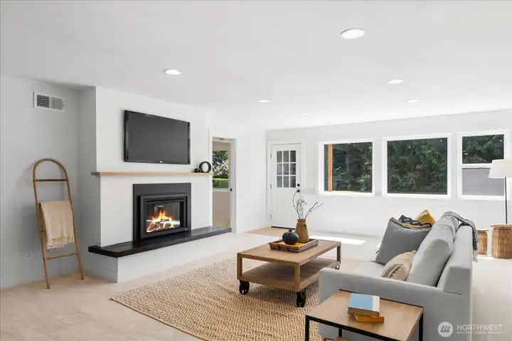 Inviting lower-level living space with fireplace and room to spread out