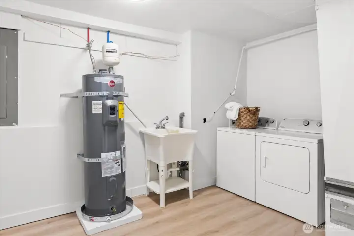 Functional utility and laundry space with extra storage potential