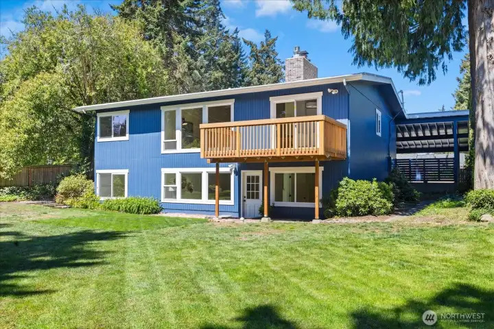 Spacious backyard and deck create the perfect setting for entertaining outdoors