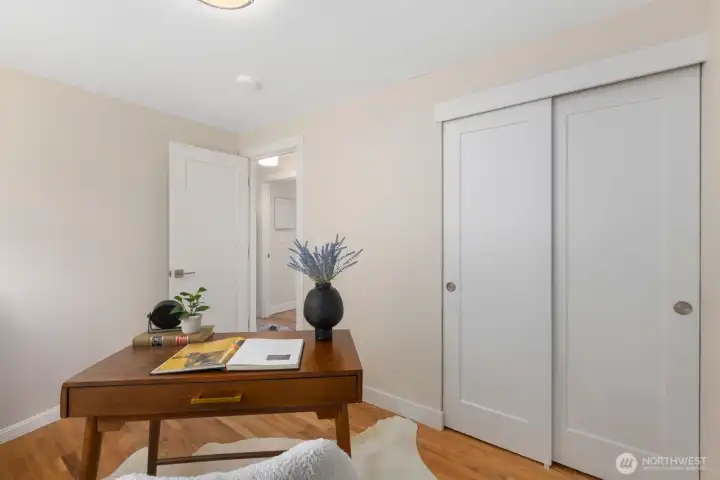 Second bedroom styled as an at home office