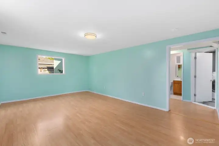 Fully-finished daylight lower level boasts an additional 1000SF of living space. Expansive family/rec room pictured here