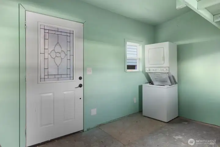 Use shed for storage and/or additional living space! W/D combo pictured here was previously used for upper level laundry