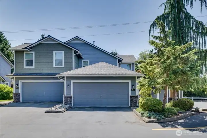 B2 is to the right with a large garage that is NOT underneath your living space!!  Newer siding, roof and gutters, and windows in 2021!