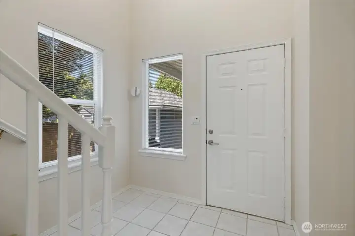 Vaulted ceilings greet you when you enter the home. Tiled entry!