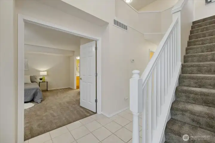 Main floor Primary with French doors, and plenty of space for all of your furniture needs!